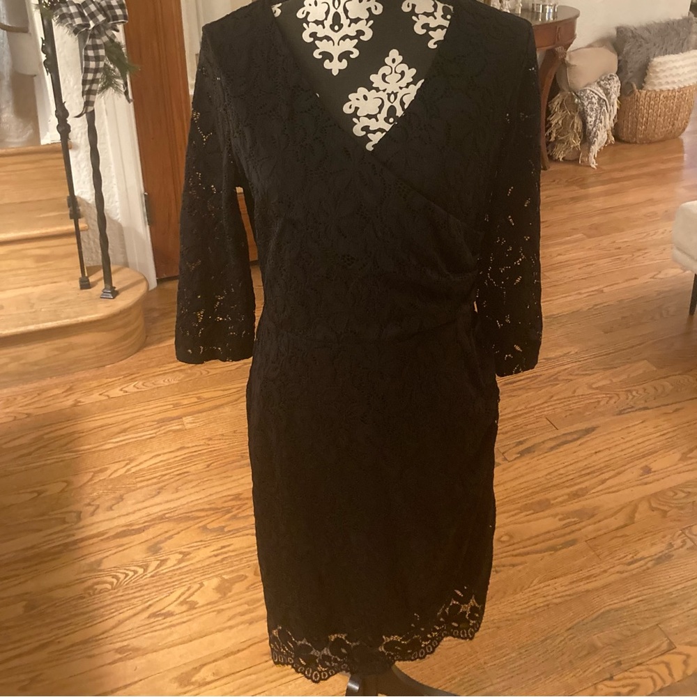 Beautiful black lace dress size large, NWT.